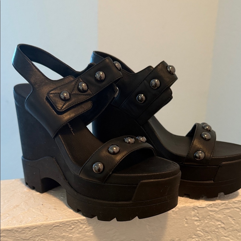 Black Studded Platform Sandals
Jessica Simpson